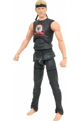 JOHNNY LAWRENCE EAGLE FANG FIGURA 18 CM COBRA KAI PREVIEWS EXCLUSIVE RE-RUN