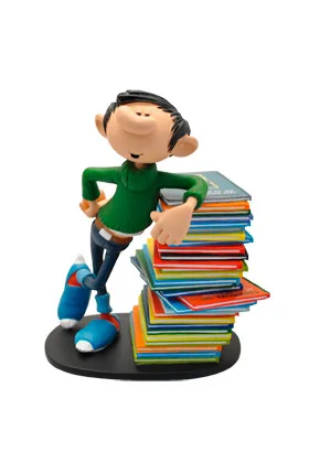GASTON APOYADO EN PILA DE COMICS ESTATUA RESINA 17 CM GASTON EL GAFE